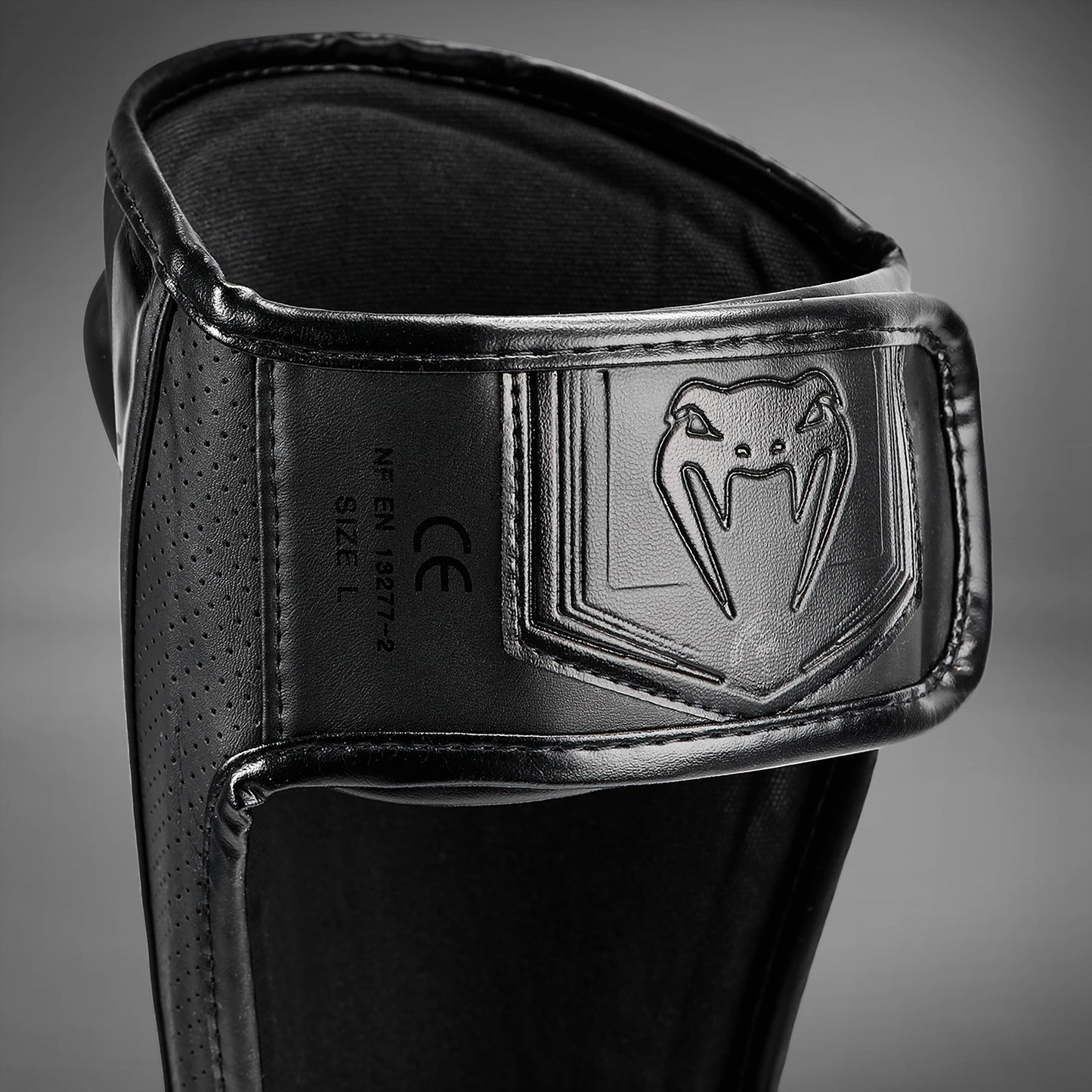 Venum Elite Evo Schienbeinschoner - Schwarz/Schwarz