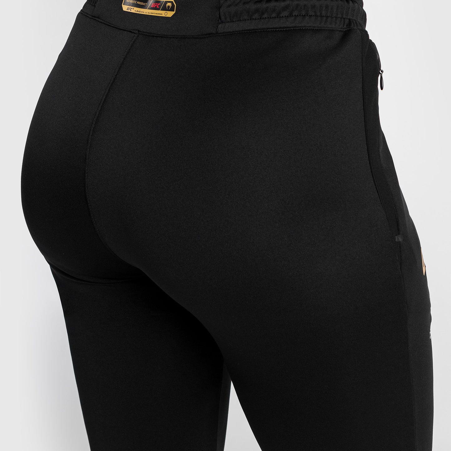 UFC Adrenaline by Venum Authentic Fight Night Walkout-Hose für Frauen Women’s Walkout Pant - Champion