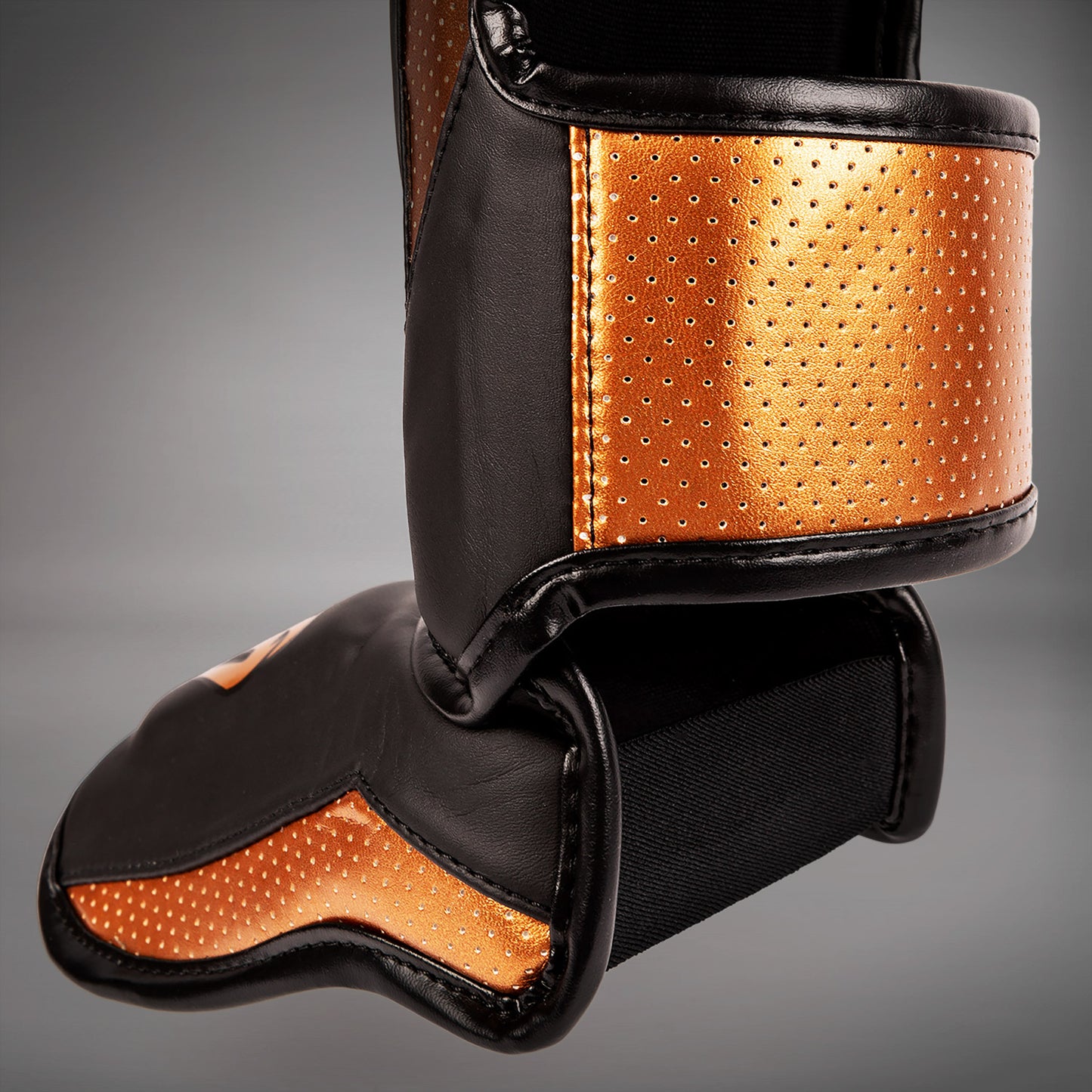 Venum Elite Evo Schienbeinschoner - Schwarz/Bronze