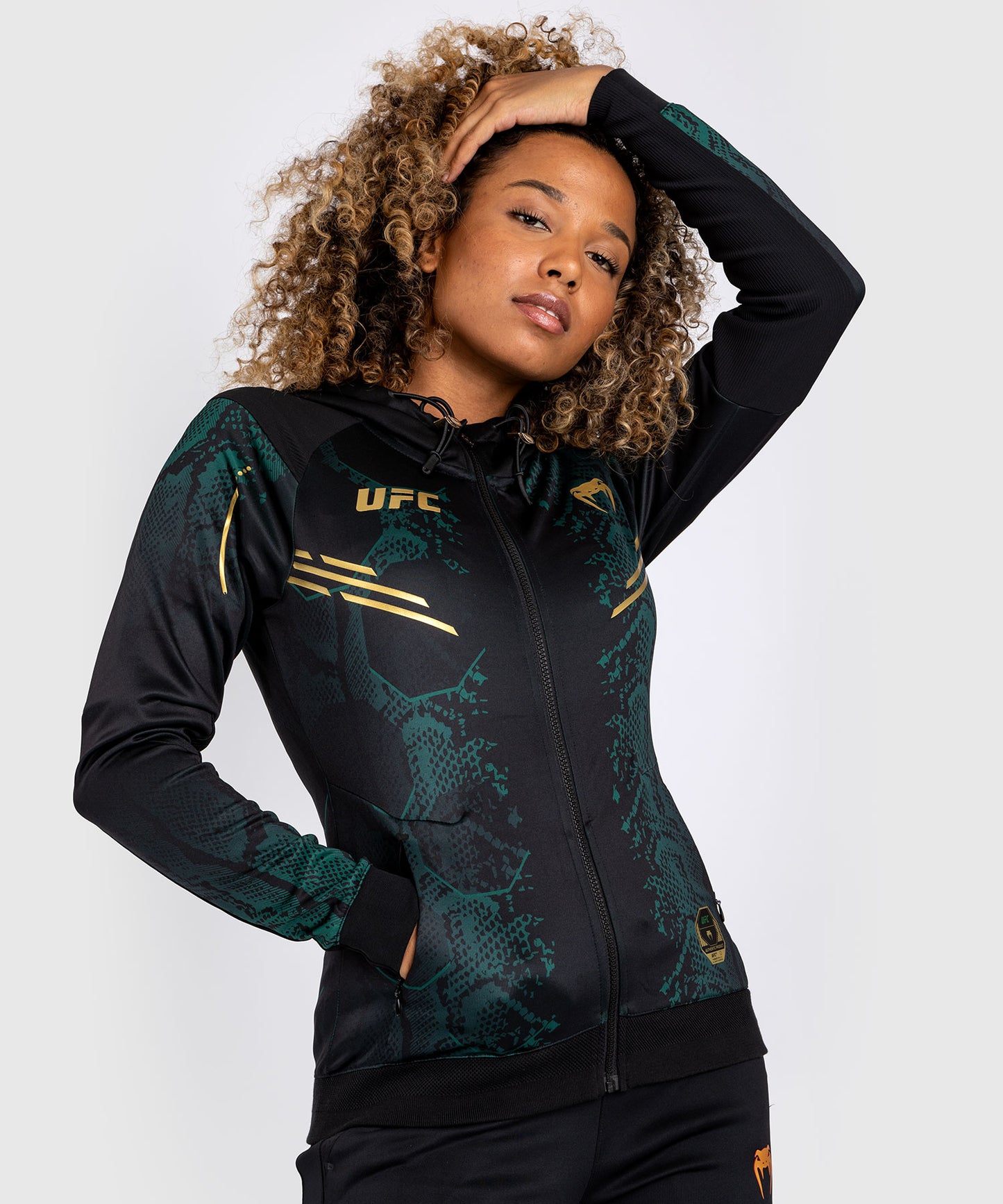 UFC Adrenaline by Venum Authentic Fight Night Walkout-Hoodie für Frauen - Emerald Edition - Grün/Schwarz/Gold