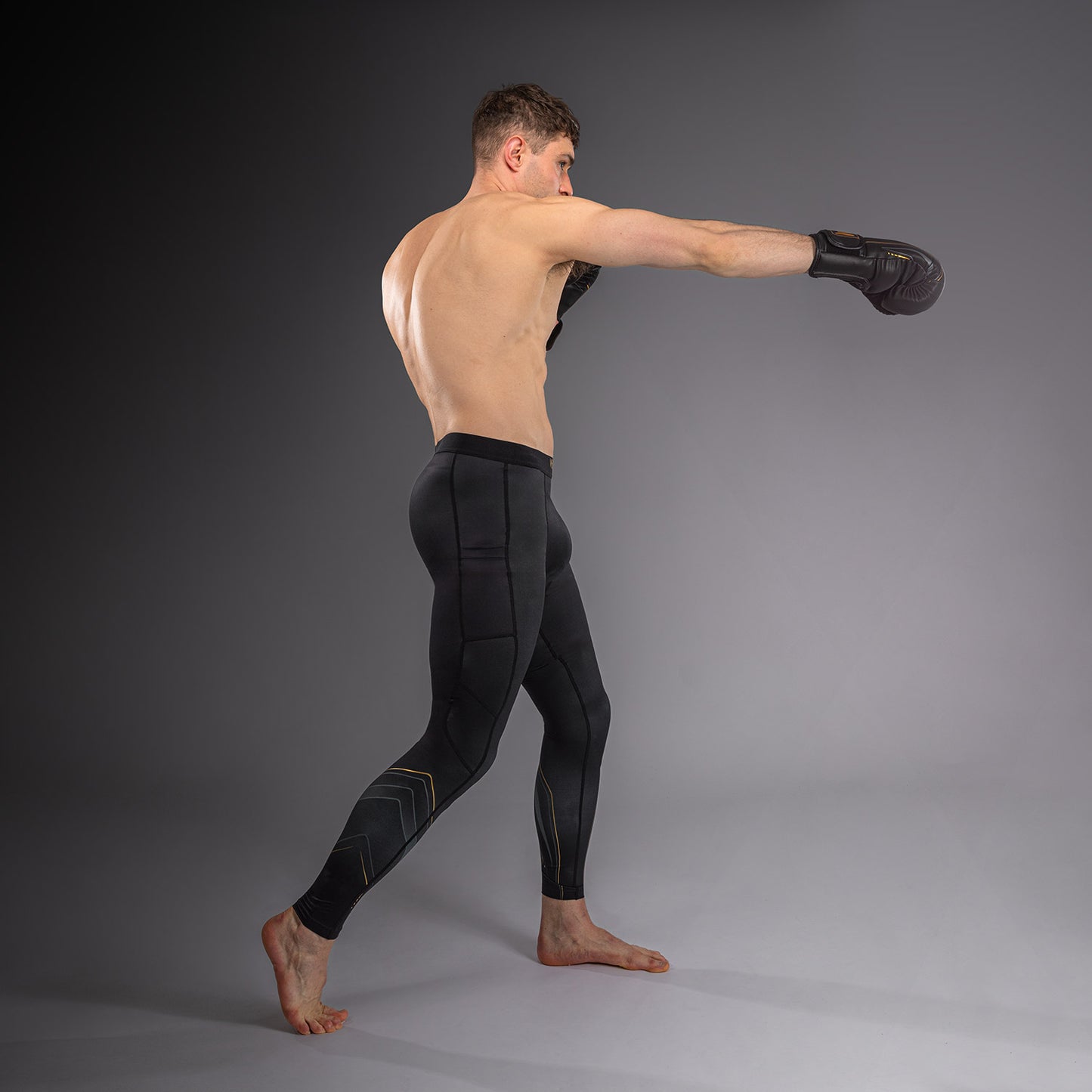 Venum Streamline Spats – Schwarz/Gold
