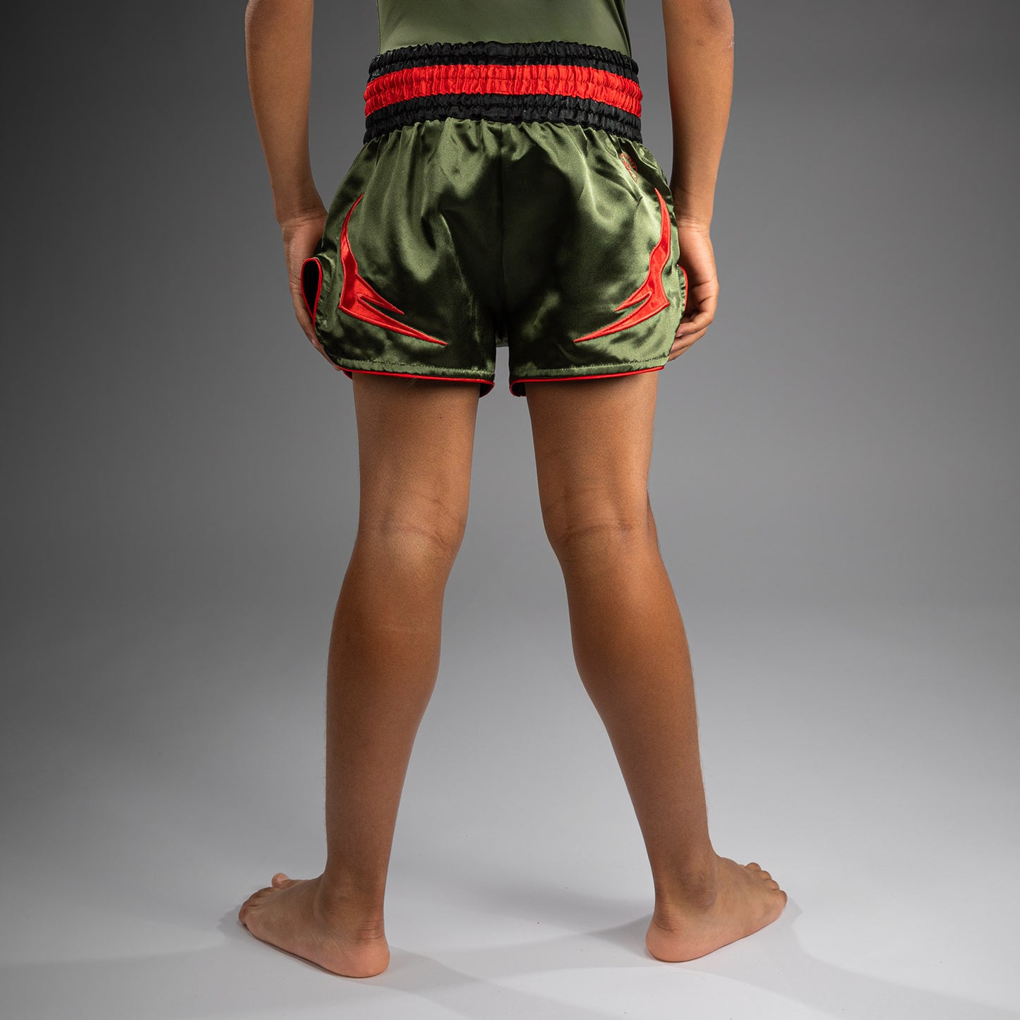Venum Inferno Kinder Muay Thai Shorts - Armeegrün/Orange