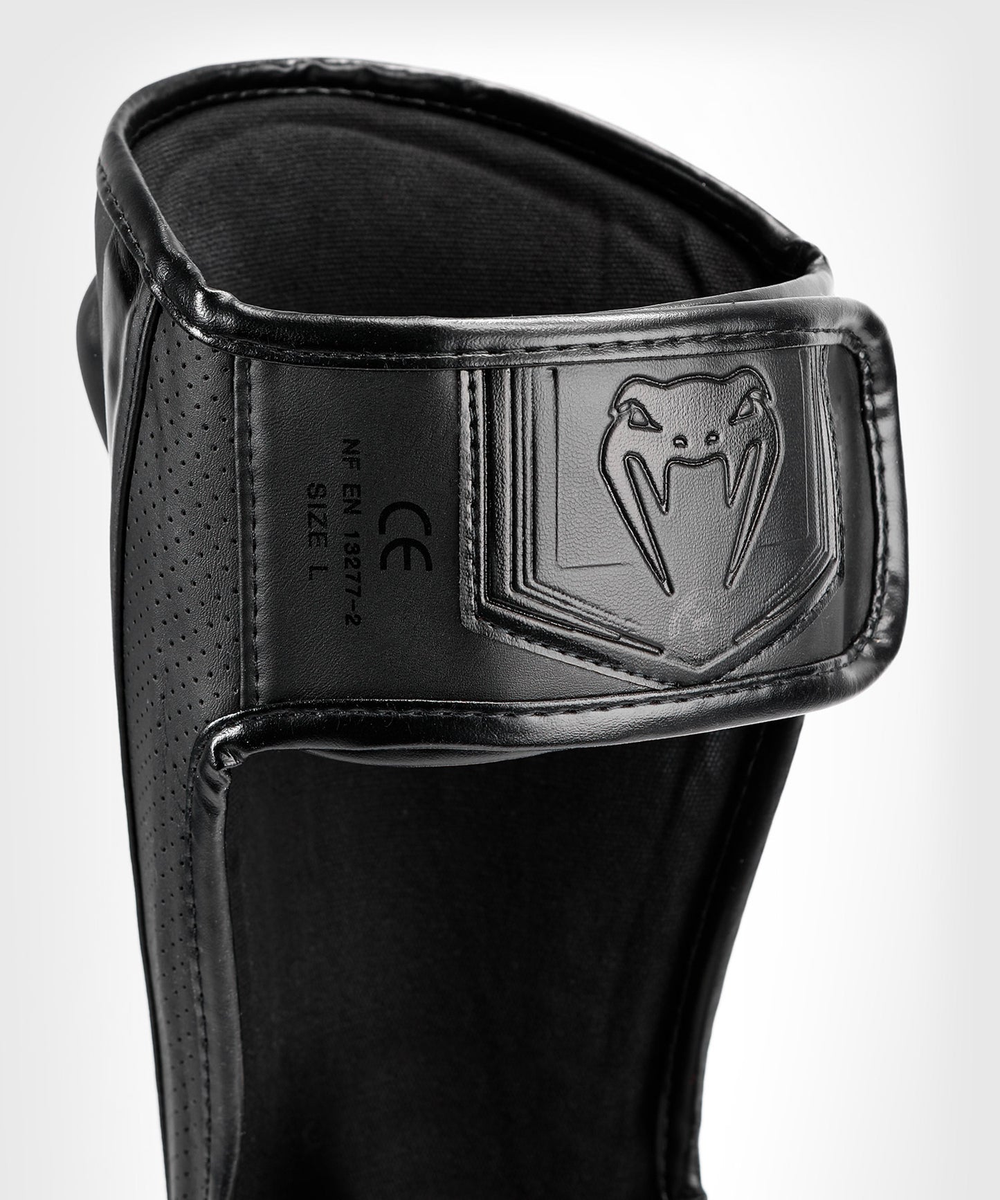 Venum Elite Evo Schienbeinschoner - Schwarz/Schwarz