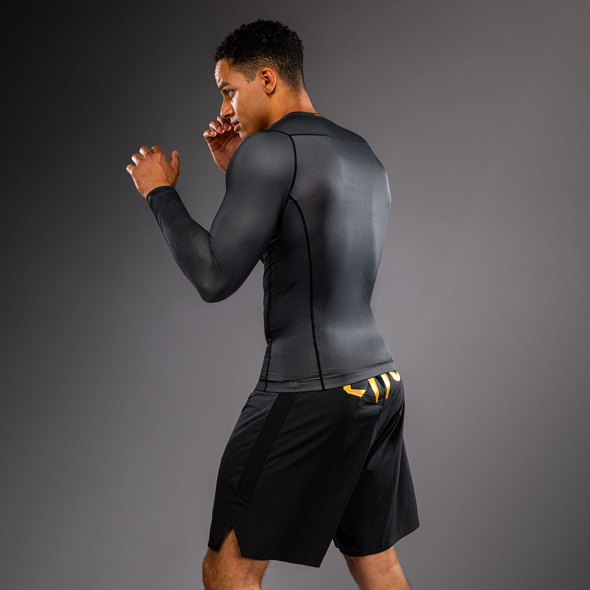Venum Attack Langarm-Rashguard - Schwarz/Gold