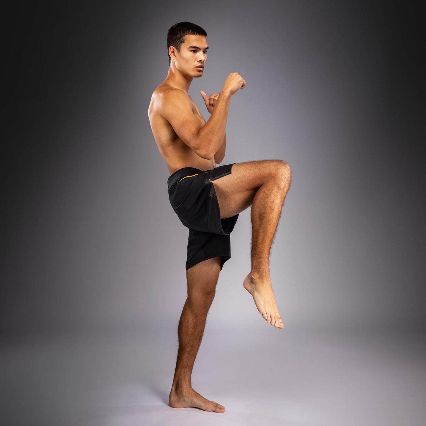 Venum G-Core Fightshorts - Schwarz/Gold