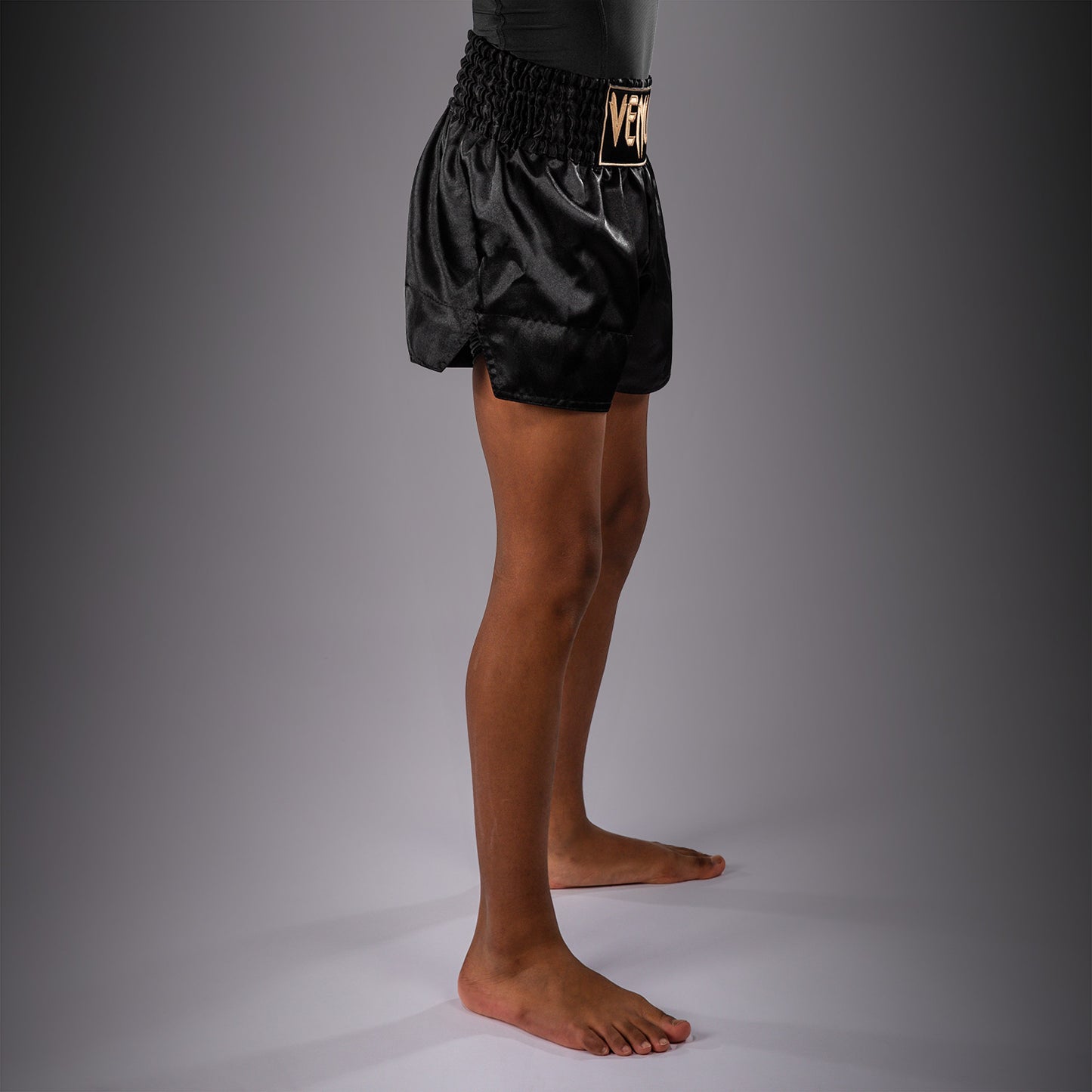 Venum Classic Muay-Thai-Shorts für Kinder – Schwarz/Gold
