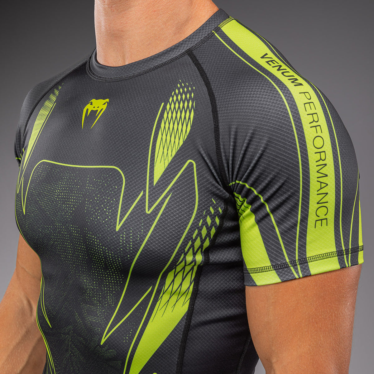 Venum Amazonia Reborn Kurzarm-Rashguard - Schwarz/Grün