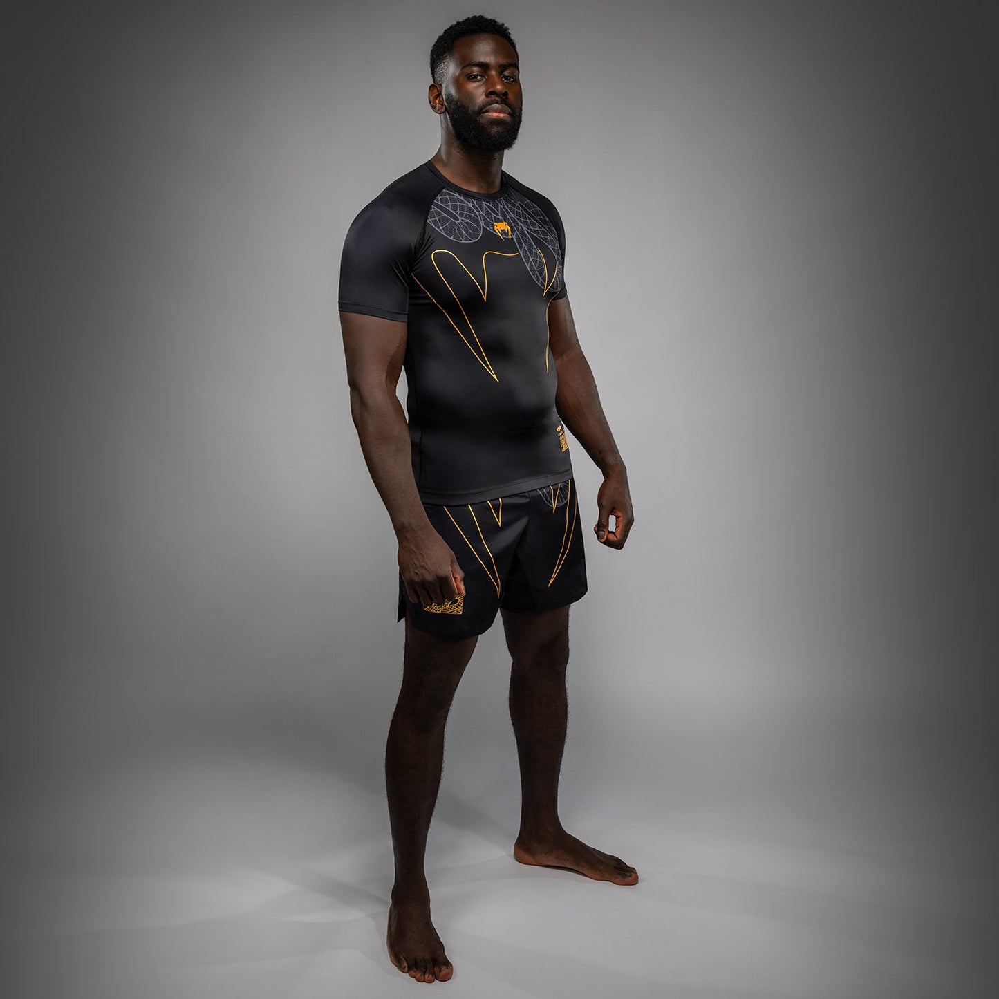 Venum Serpenti Kurzarm Rashguard – Schwarz/Silber/Gold