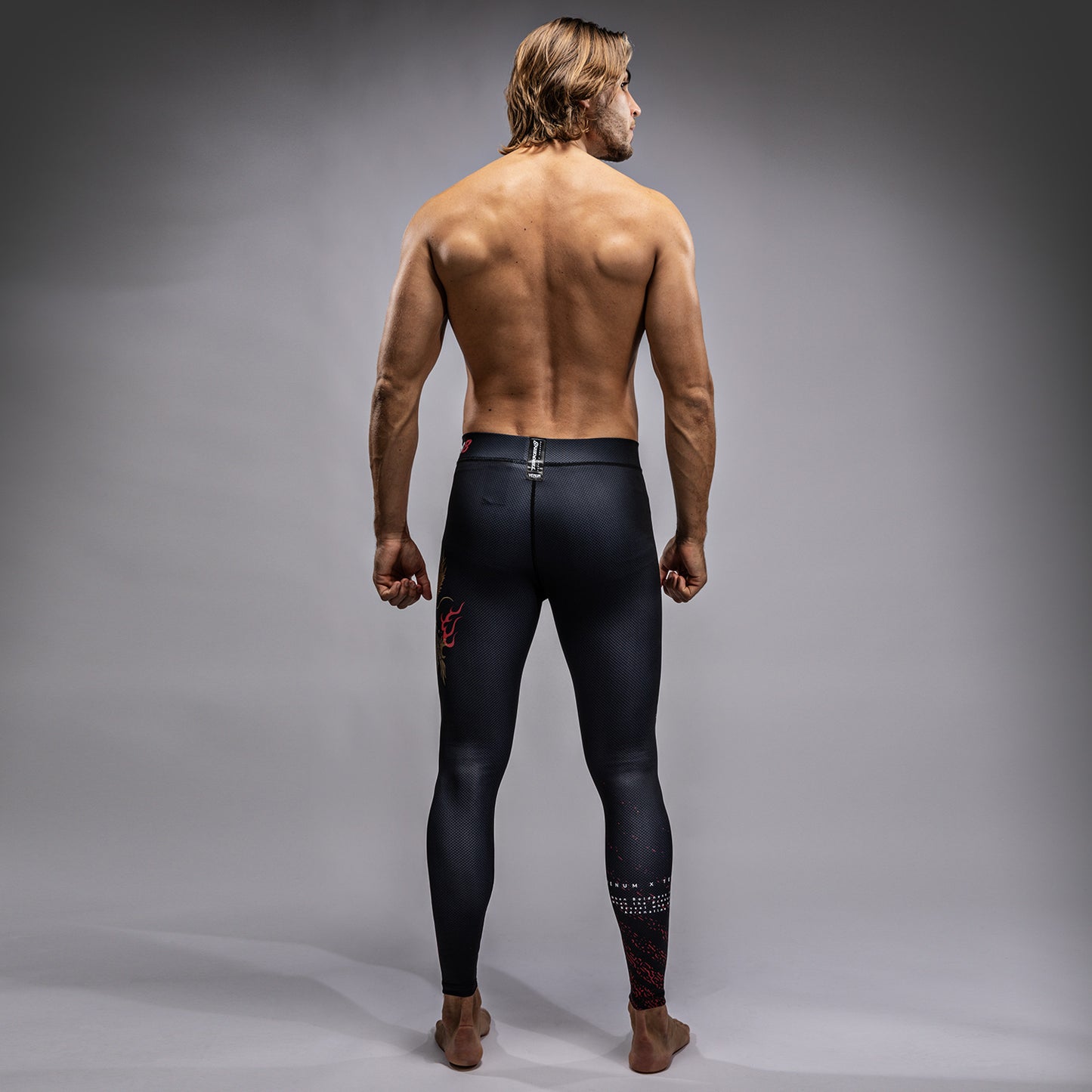 Venum x TEKKEN 8 - Marshall Law Spats - Schwarz/Rot/Gold