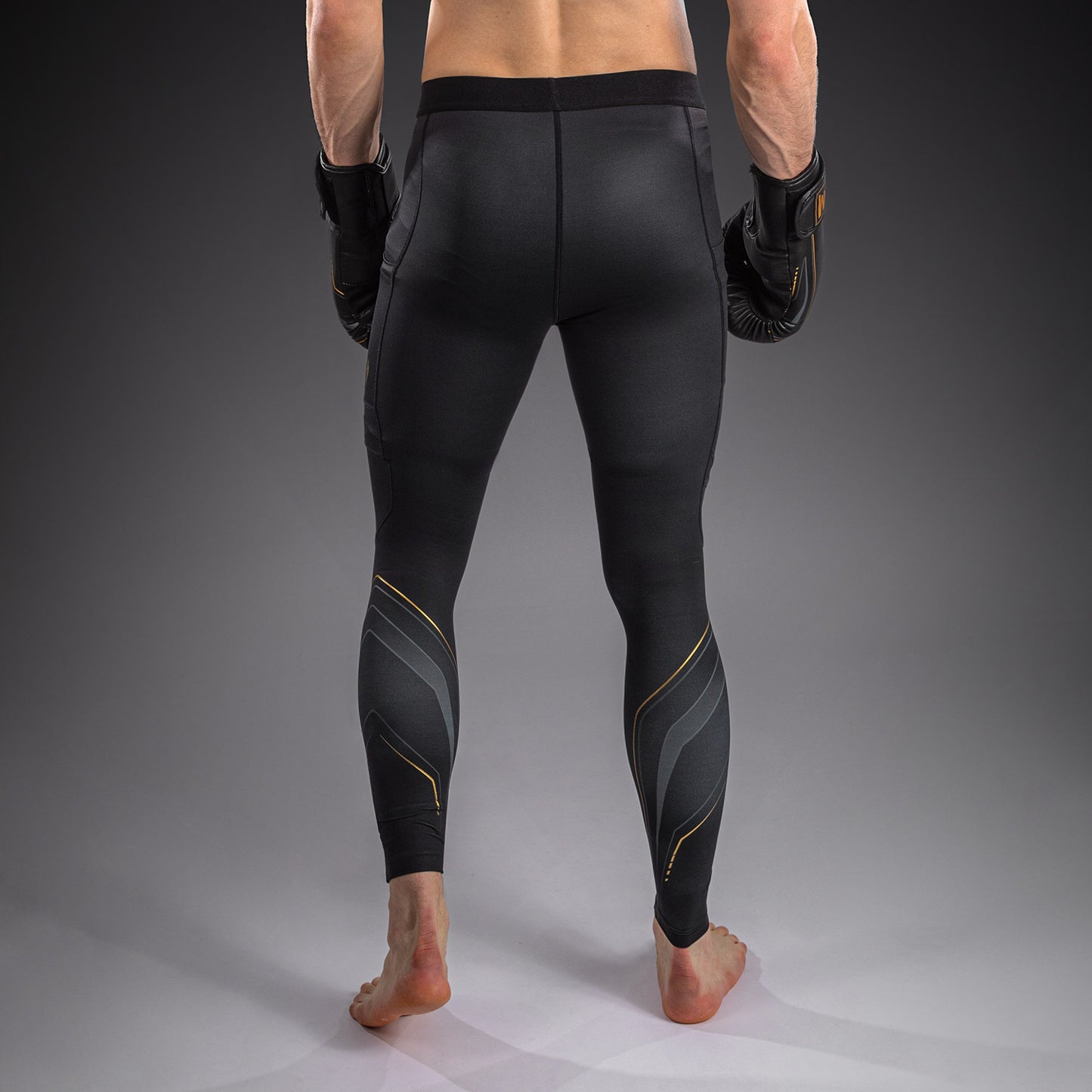 Venum Streamline Spats – Schwarz/Gold