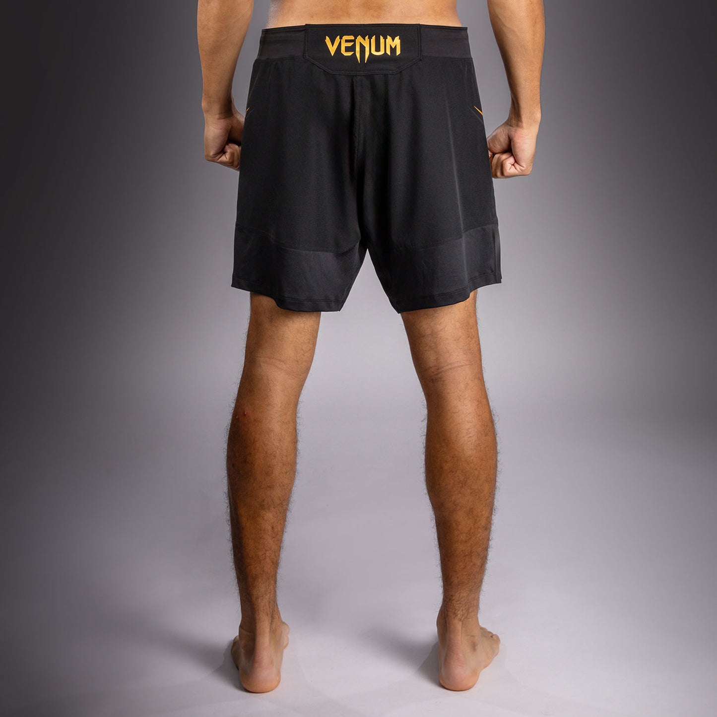Venum G-Core Fightshorts - Schwarz/Gold