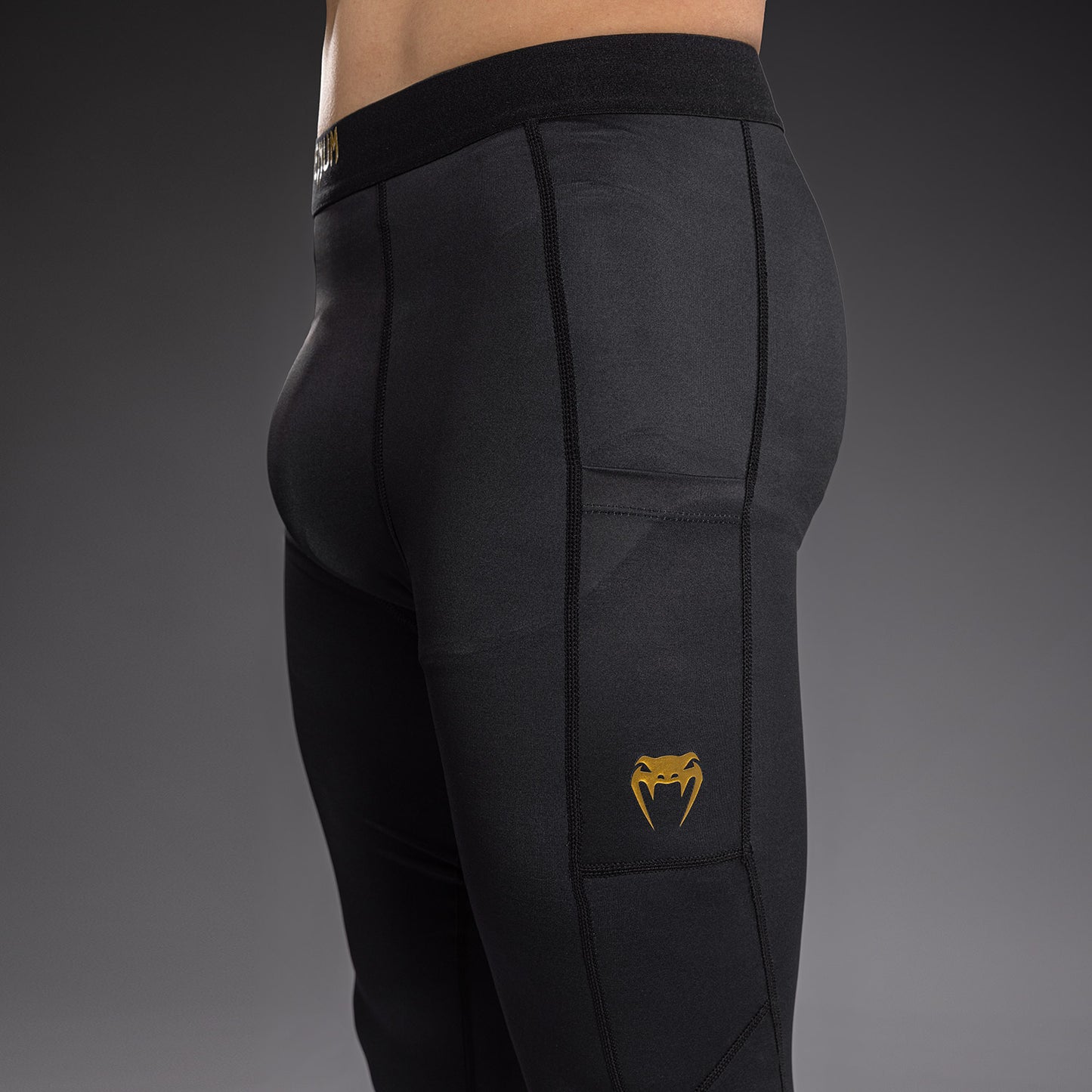 Venum Streamline Spats – Schwarz/Gold