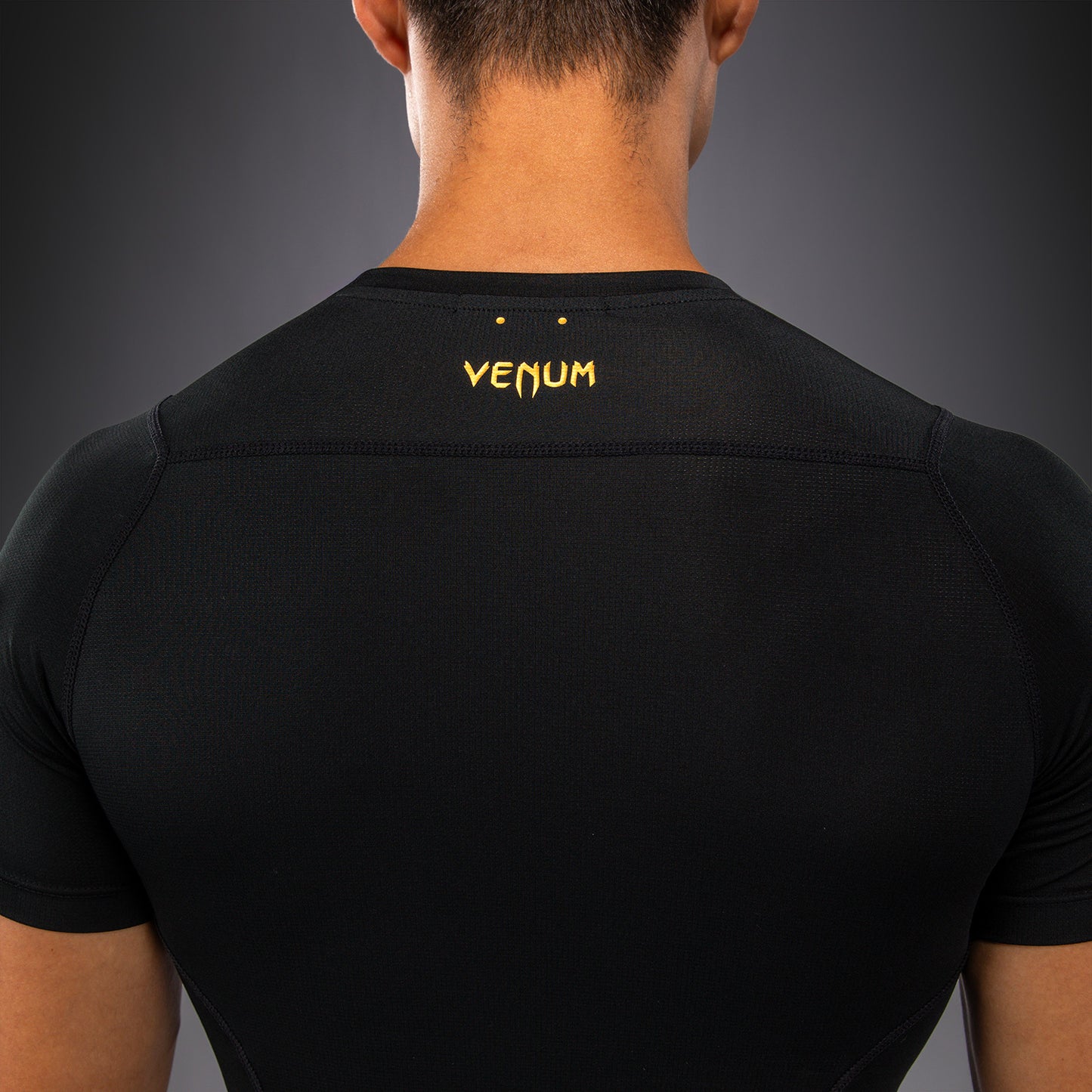 Venum G-Core Kurzarm Rashguard - Schwarz/Gold