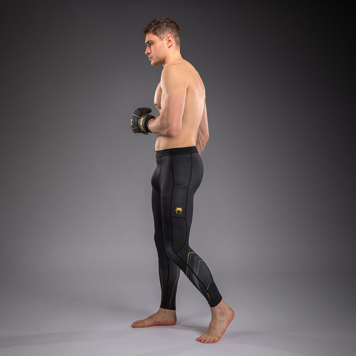 Venum Streamline Spats – Schwarz/Gold