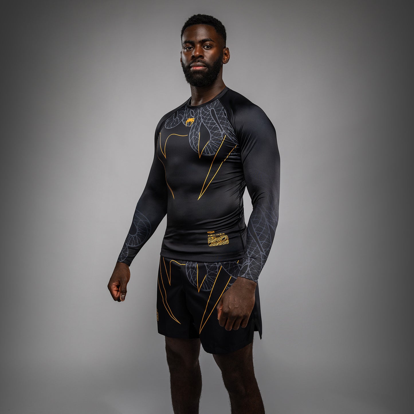 Venum Serpenti Langarm Rashguard – Schwarz/Silber/Gold