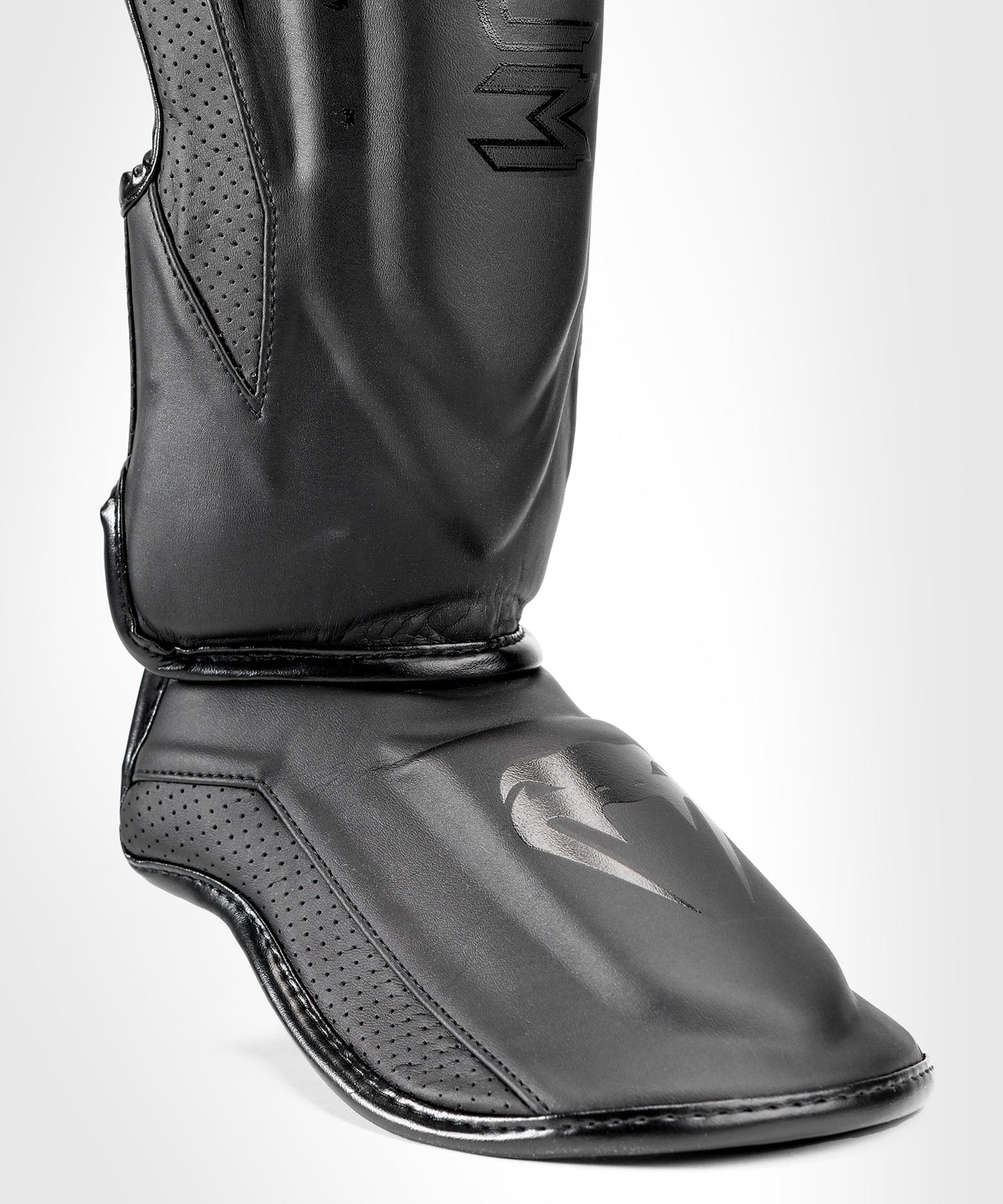 Venum Elite Evo Schienbeinschoner - Schwarz/Schwarz