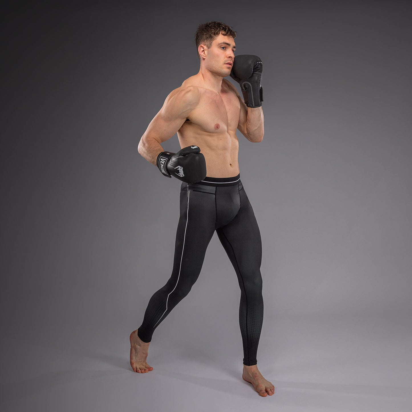 Venum Stealth Spats – Schwarz/Weiß
