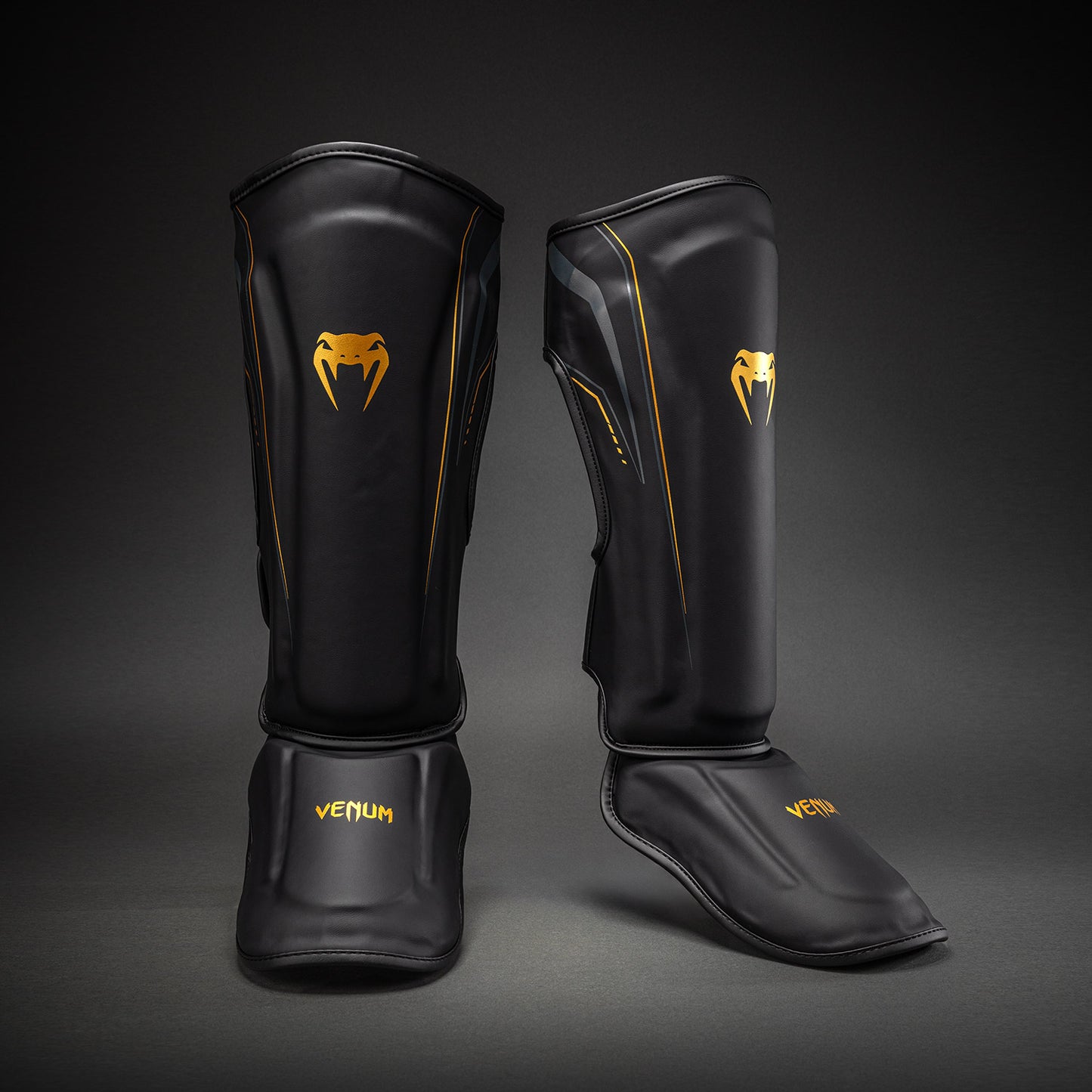 Venum Streamline Schienbeinschoner – Schwarz/Gold
