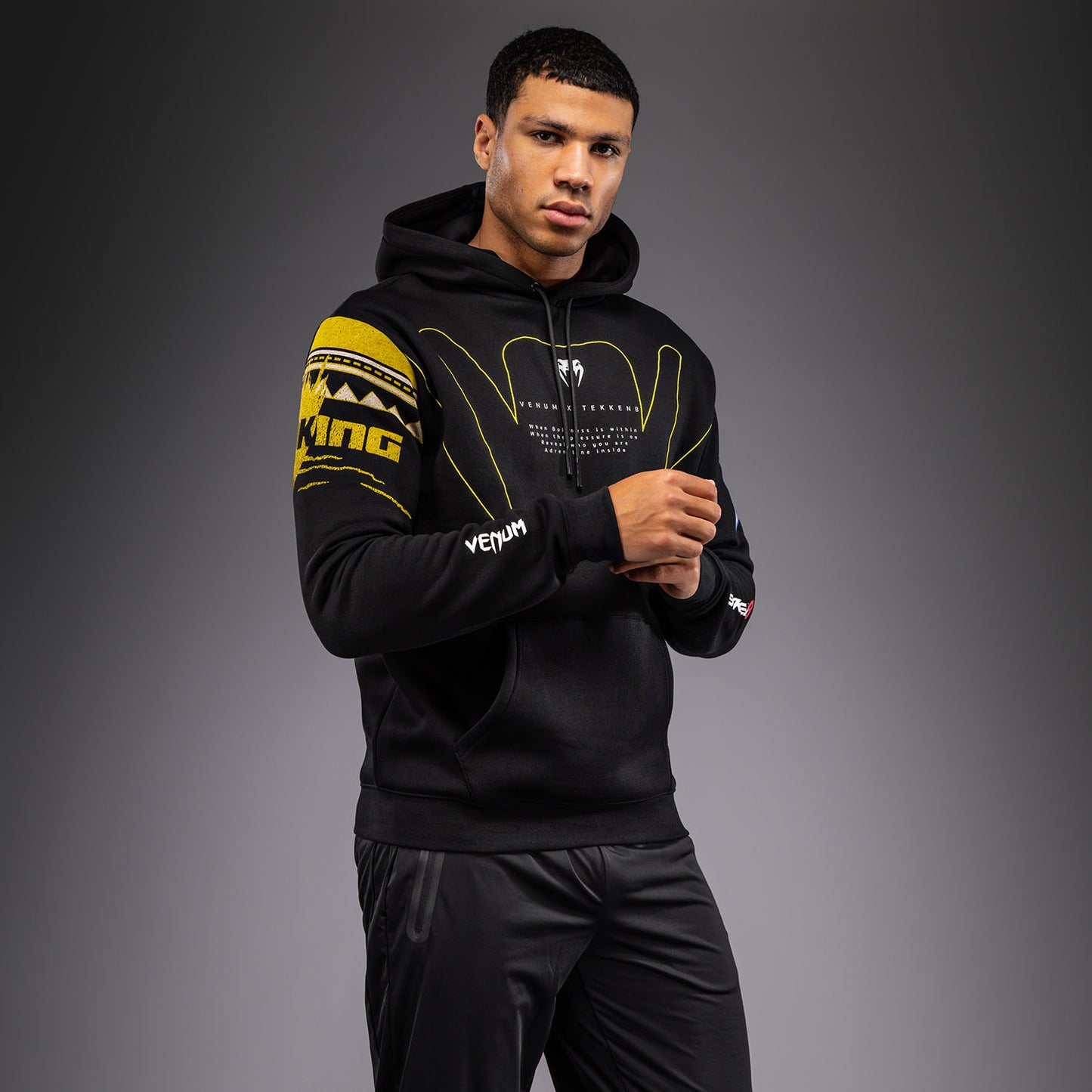 Venum x TEKKEN 8 Kapuzenpullover - King - Schwarz/Gelb