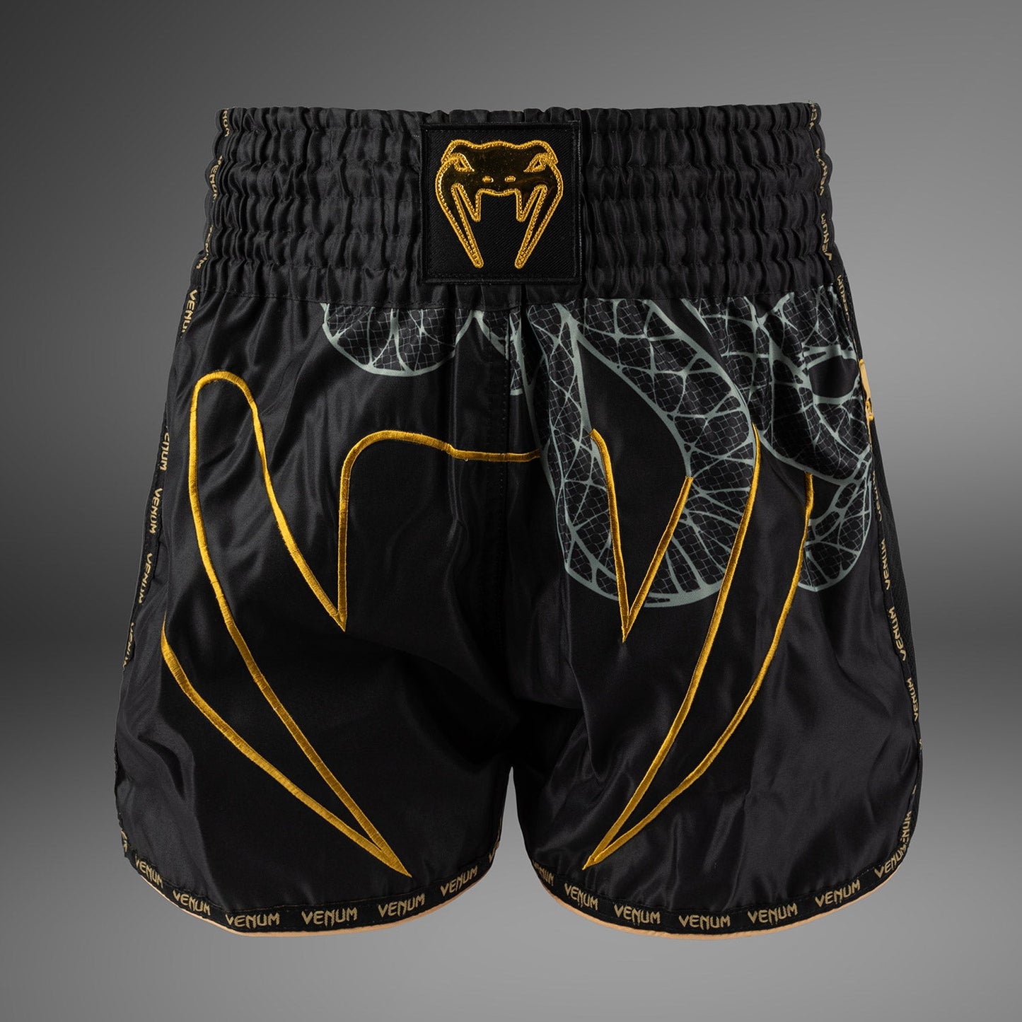 Venum Serpenti Muay Thai Shorts – Schwarz/Silber/Gold