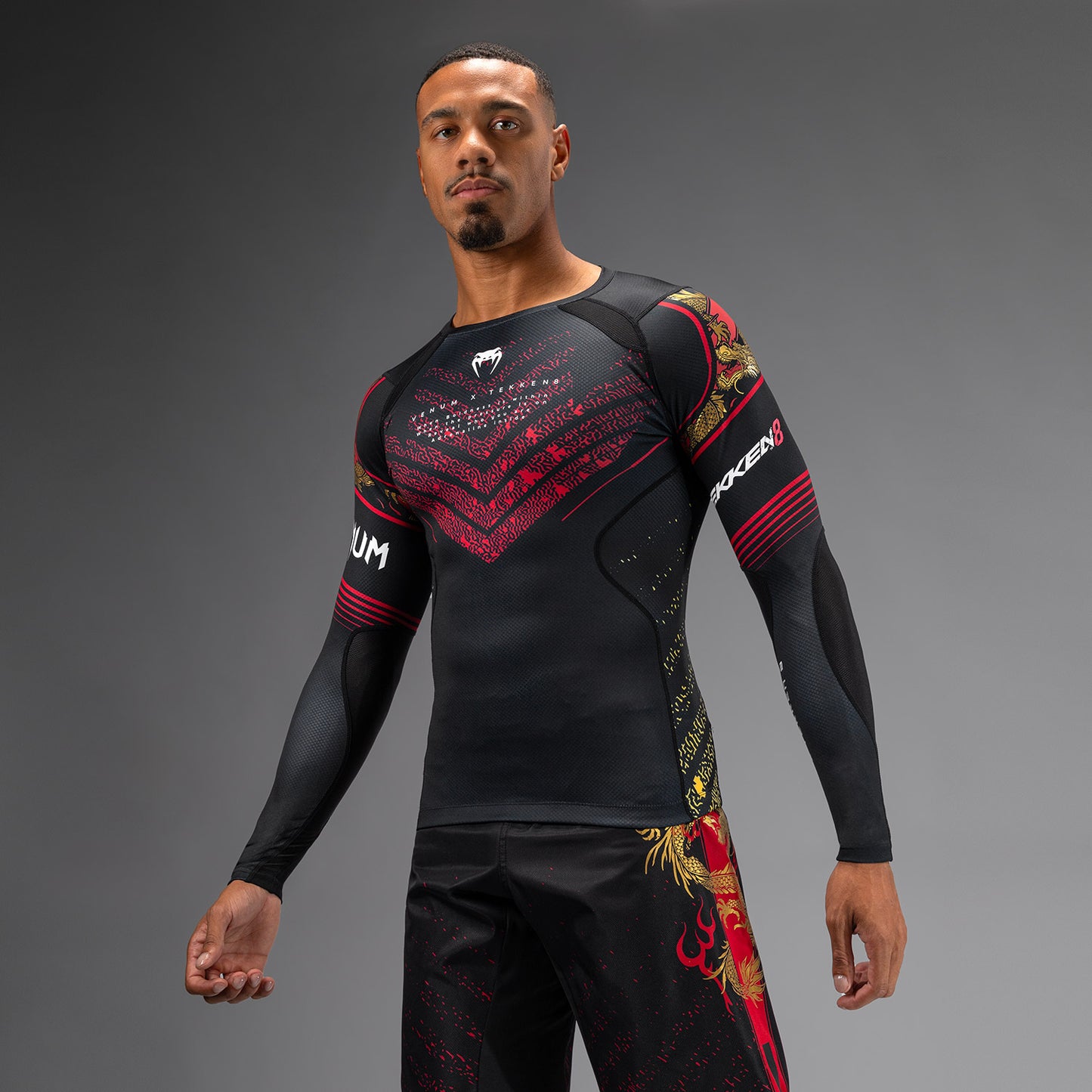 Venum x TEKKEN 8 - Marshall Law Rashguard - Schwarz/Rot/Gold