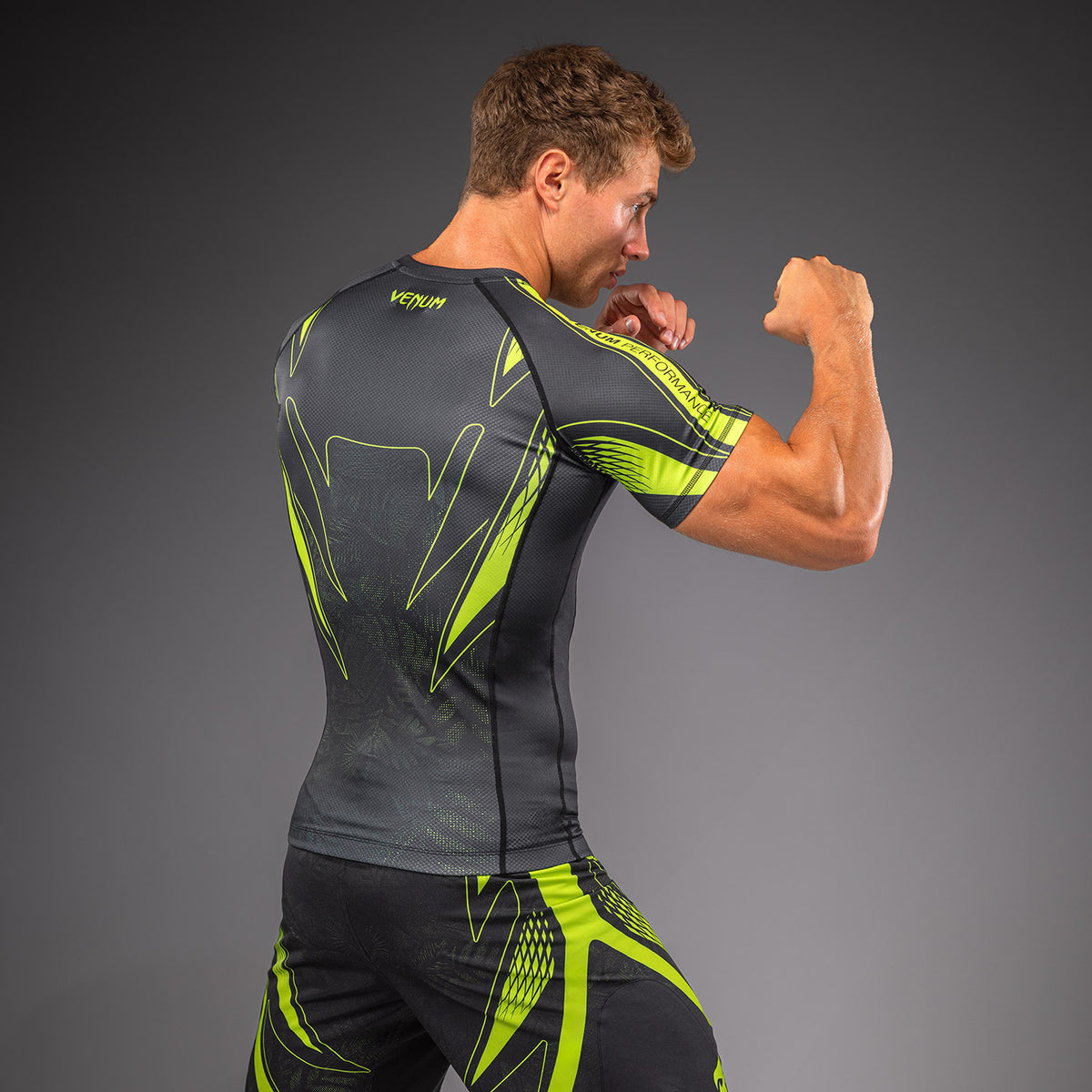 Venum Amazonia Reborn Kurzarm-Rashguard - Schwarz/Grün
