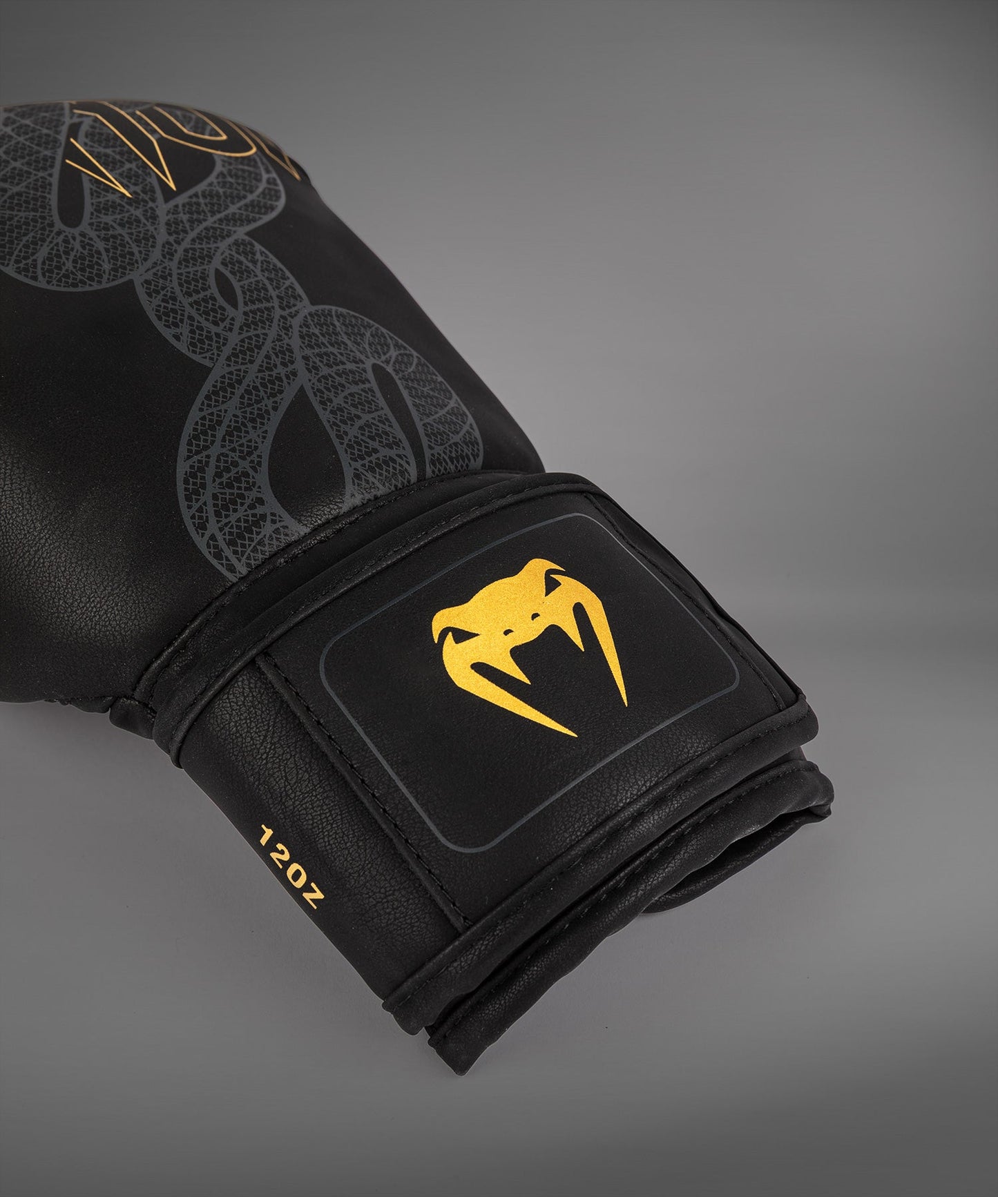 Venum Serpenti Boxhandschuhe – Schwarz/Silber/Gold