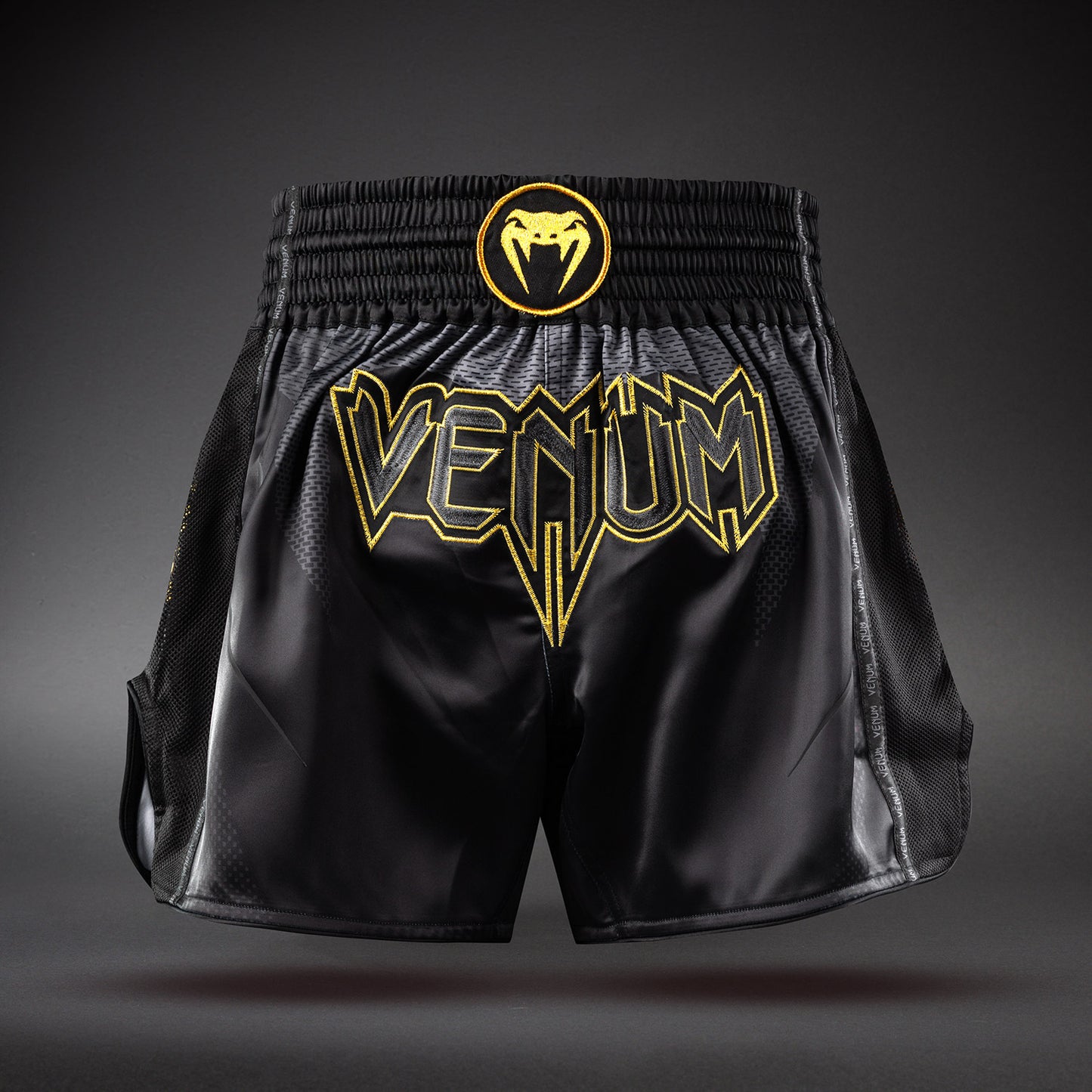 Venum G-Core Muay-Thai-Shorts - Schwarz/Gold