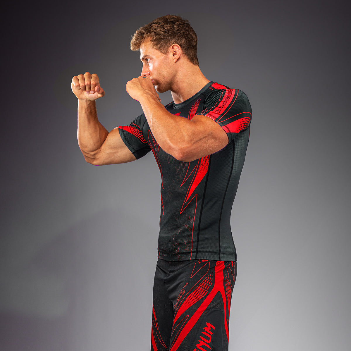 Venum Amazonia Reborn Kurzarm-Rashguard - Schwarz/Rot