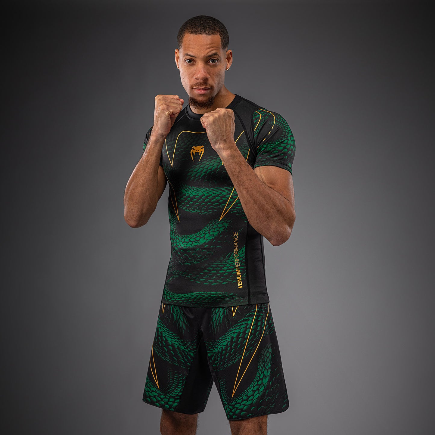 Venum Matupa Kurzarm Rashguard - Schwarz/Grün/Gold